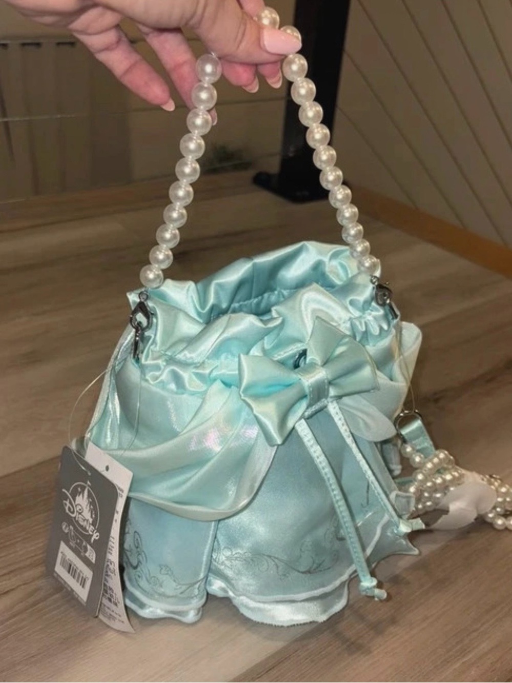 Disney Satin Drawstring Mini Bag in Light Blue with Pearl Handle